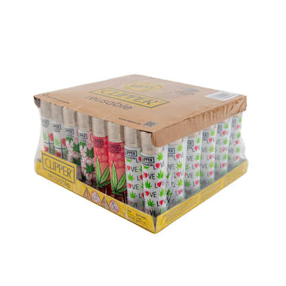 Box of Clipper lighters with various designs on a white background